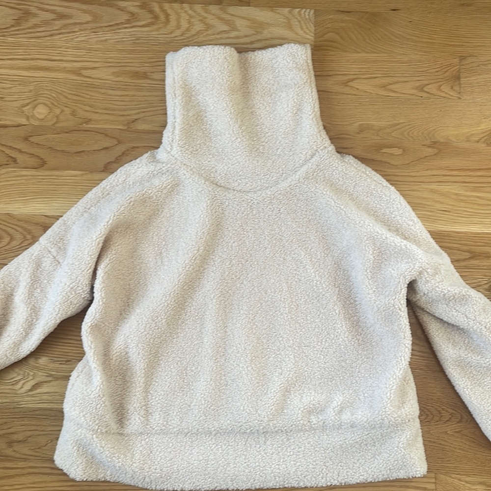 Tuckerneck camel teddy turtleneck